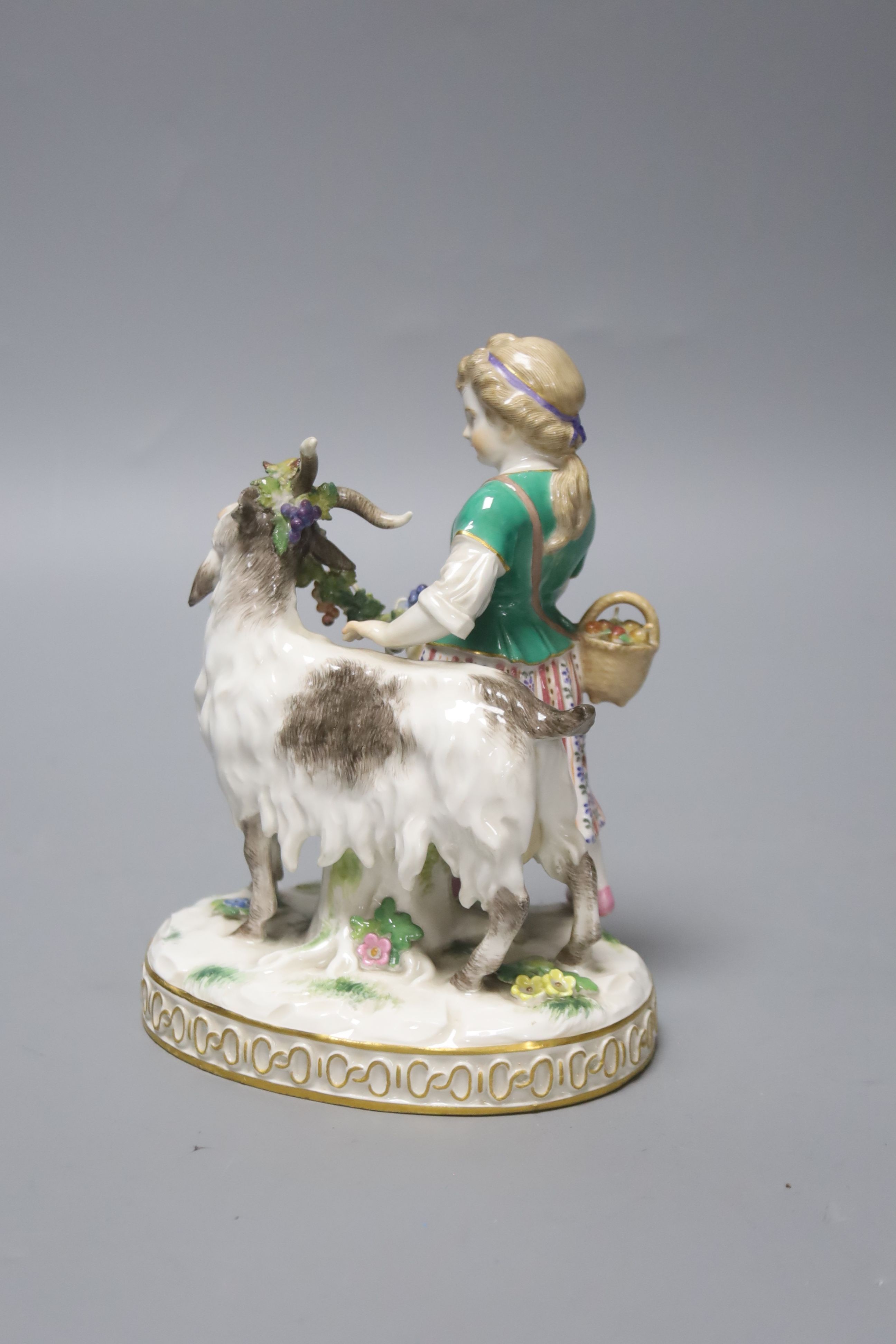 A late 19th/early 20th Meissen girl and goat group, model number H81, 15cm 15cm